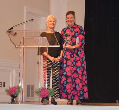 JA of North Florida President Shannon Italia (pictured, right) presents the JA GIRL$ Legacy Award to Susan Remmer Ryzewic